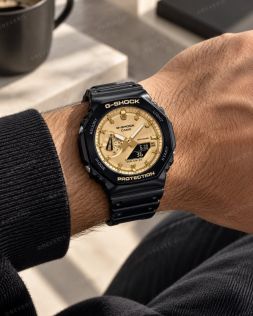 Casio herreur med dual display, sort resinrem og gylden urskive i 45mm