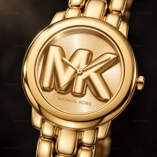 Gyldent Michael Kors dameur med stort MK-logo og kraftig stållænke i 36mm