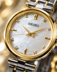 Seiko tofarvet dameur med 8 diamanter, safirglas og perlemorsurskive 29mm