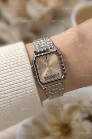 Vintage Casio dual display ur med digital og analog visning samt sunray urskive
