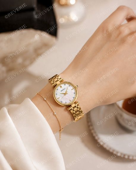 Seiko guldfarvet dameur med 8 diamanter, safirglas og perlemorsurskive 29mm